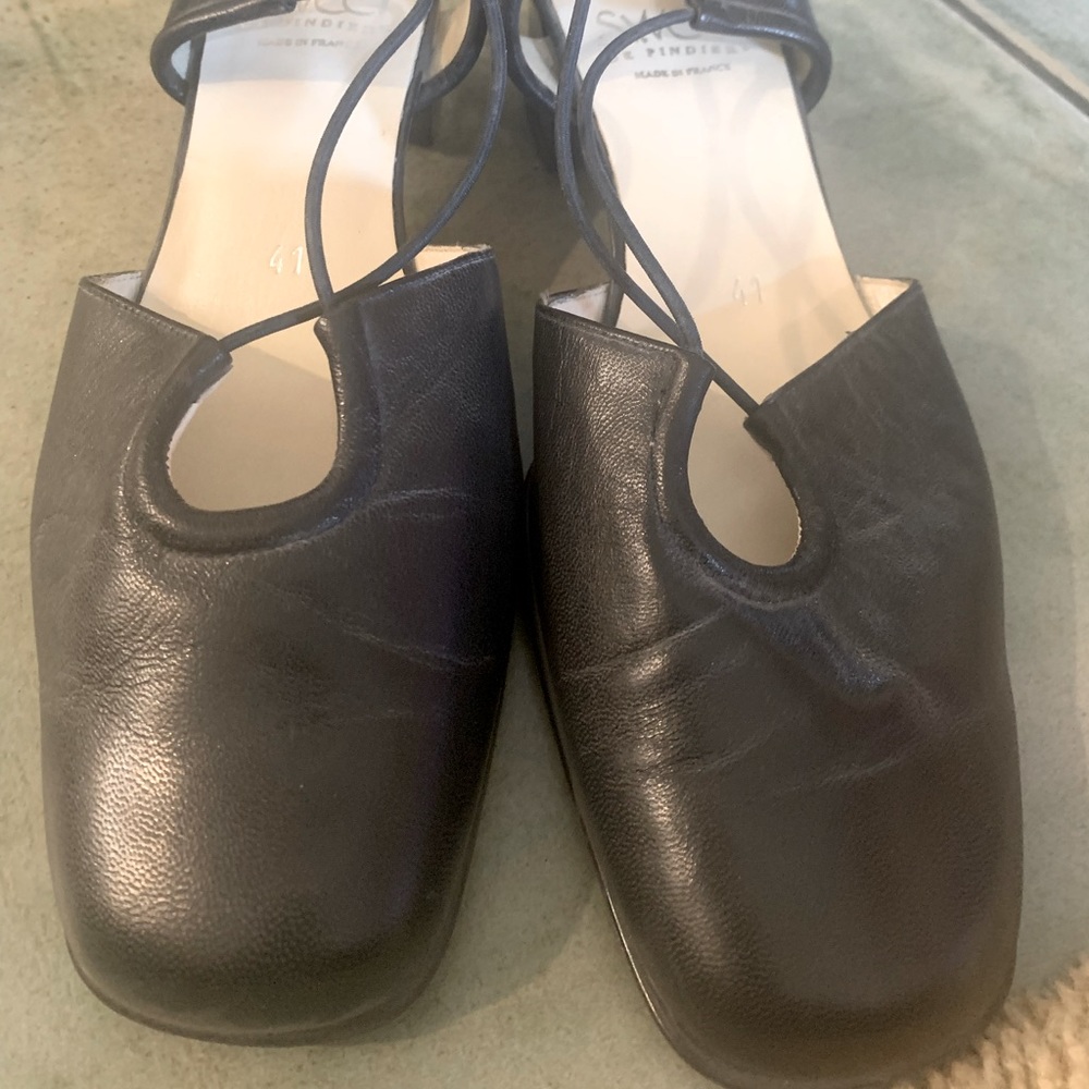 Black leather heels labeled size 41